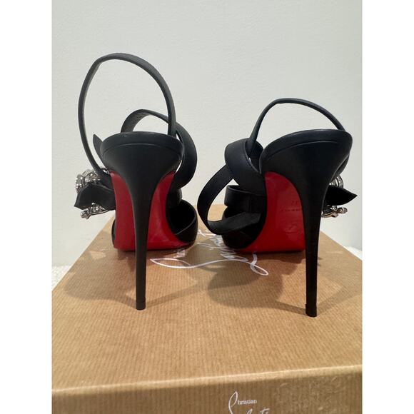 CHRISTIAN LOUBOUTIN 37 Giddylina 100 buckle-embellished leather pumps$1,495 - Picture 6 of 9